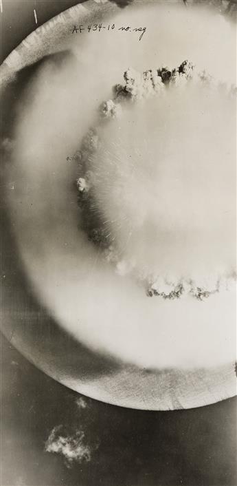 (NUCLEAR TESTING) Two photographs depicting atomic bomb testing, one a rare aerial shot, from Bikini Atoll. 1946.